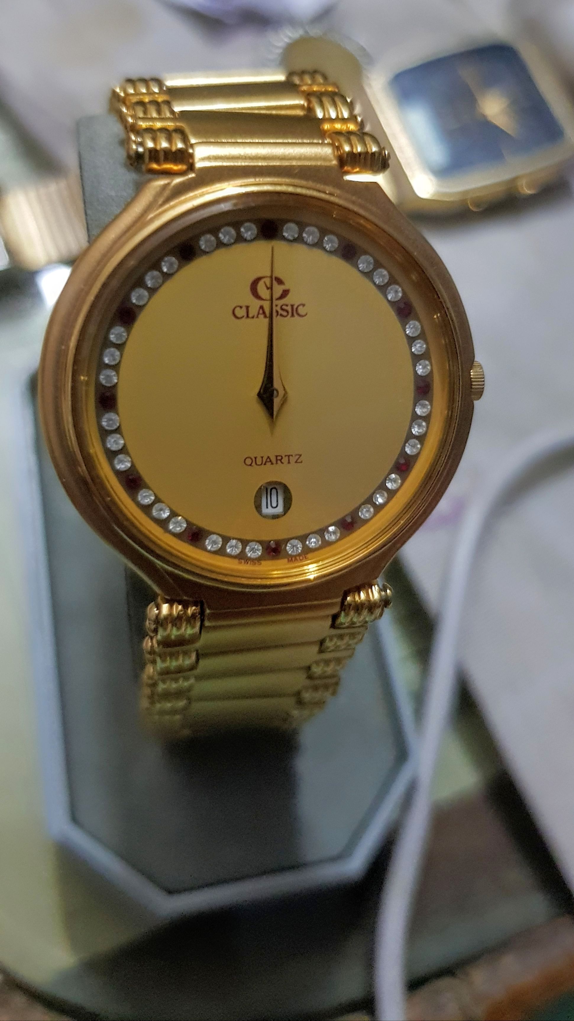 ساعه صناعه سويسري اصلي مطليه بذهب عيار 18k