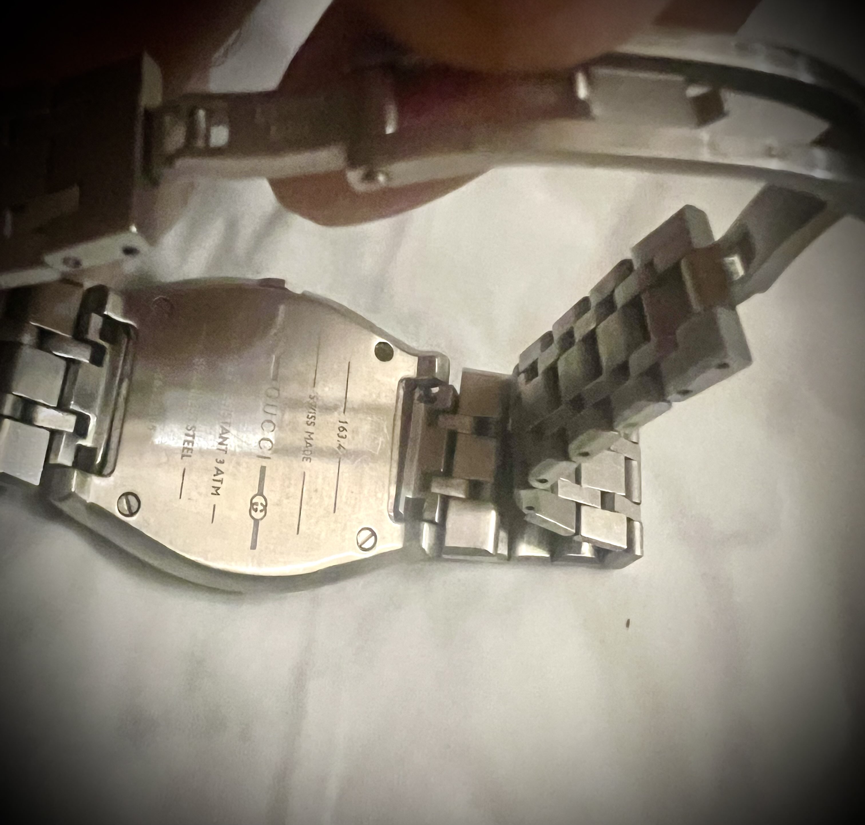 ساعه جوتشي اصليه