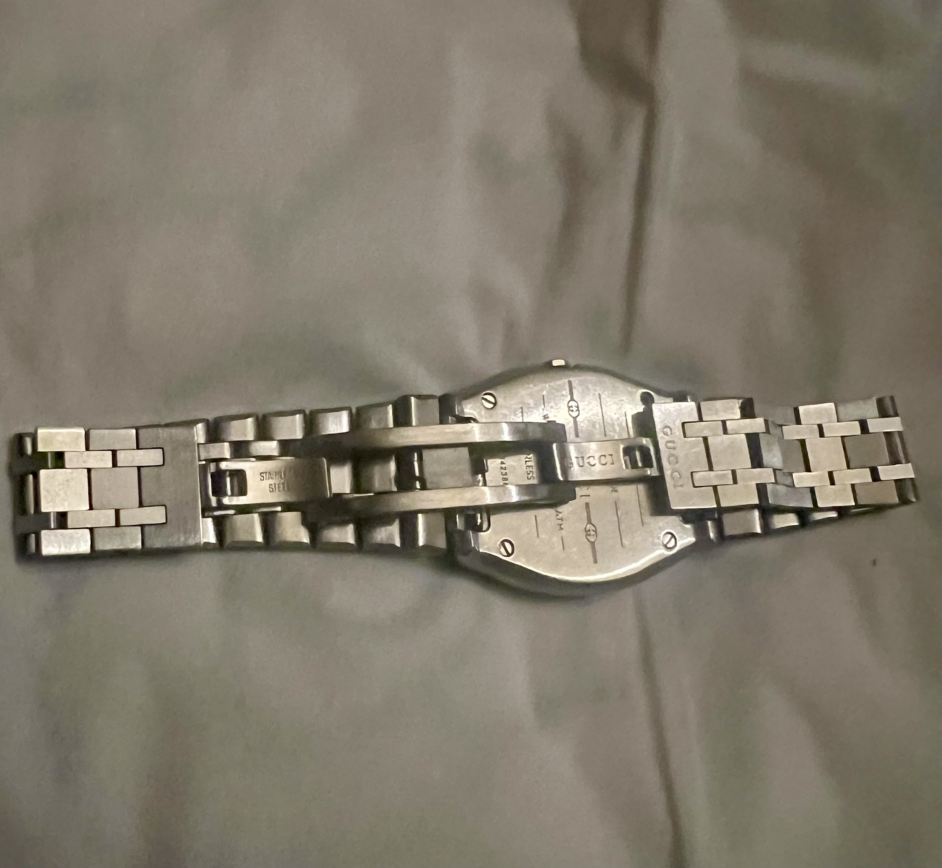 ساعه جوتشي اصليه