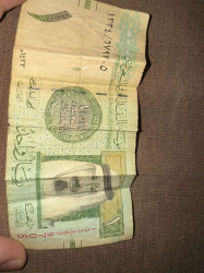 ريال الملك عبدالله بتوقيع فهد المبارك