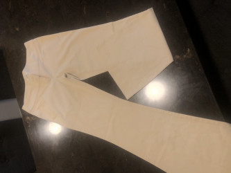 Moschino women’s beige flared jeans