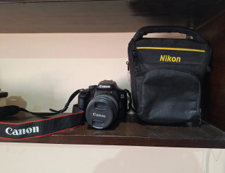 Canon EOS 4000D DSLR Camera + Lens 18-55 – حالة ممتازة